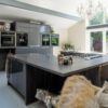 Graphite Grey Modern Slab Kitchen with Large U Shaped Island – Quooker Neff CDA Appliances – Laminate Worktops
