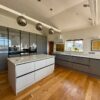 Howdens Modern Slab Graphite Grey Kitchen with Light Grey Island – Lamona Kolbe Appliances – Quartz Worktops