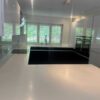 Leicht Black & White Gloss Kitchen and Peninsula with Breakfast Bar – Siemens Quooker Neff Appliances – Corian Worktops