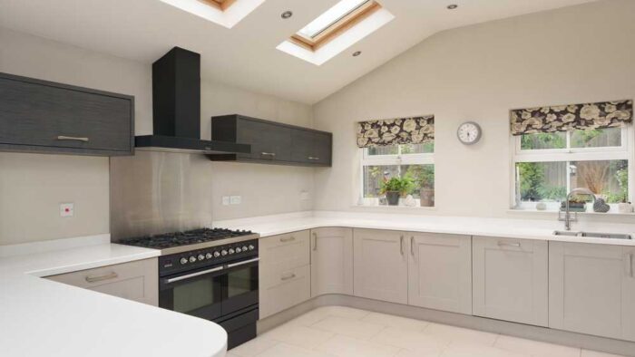 Stone Grey Shaker Kitchen with Peninsula and Utility Room – Brittania Neff De Dietrich Appliances – Resin Worktops