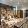 The Wood Works Luxury Four Panel Shaker Stained Oak Master Bedroom and Matching Walk-in Wardrobe Dressing Room with En-Suite Bathroom