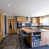Beckermann Kuchen Light Oak Kitchen with Matching Island with Breakfast Bar – Bosch Siemens Appliances - Black Satinato Granite Worktops - 3833126