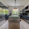 Poggenpohl Luxury Black Gloss Kitchen & Matching Island – Gaggenau Miele Appliances - Black Quartz - Granite Worktops & Stainless-Steel Breakfast Bar with Waterfall Side