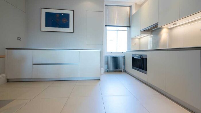 SieMatic Off White Modern Slab Kitchen – Gaggenau Miele Smeg Bosch Appliances – Corian Worktops