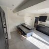 Young Blue Shaker Kitchen with Peninsula and Utility Room - Bosch Appliances – Dekton Worktops