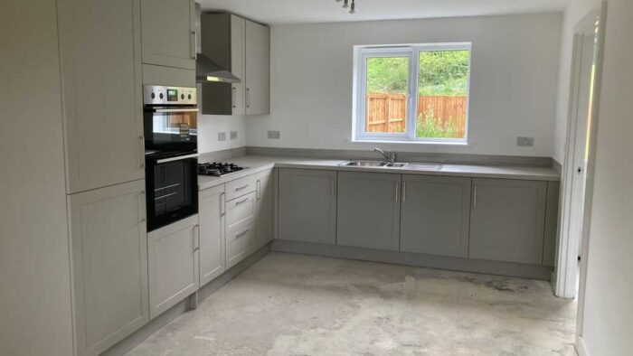Young Symphony Harvard Pebble Grey Shaker Kitchen – Zanussi Electrolux Appliances – Conway Elm Laminate Worktops