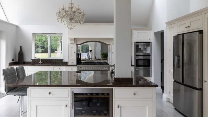 Bespoke Little Greene Clay Pale Dovetail Joint InFrame Shaker Kitchen with Island – Neff Hisense Britannia Appliances – Granite Worktops