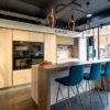 Ex Display Schmidt Strass White High Gloss & Arcos Matt Kitchen with Island – Siemens Caple Appliances – Silestone Calacatta Gold Worktop