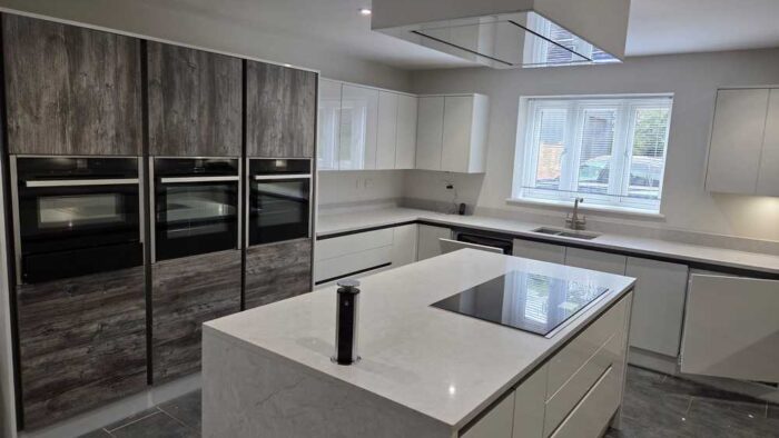 Large Wren Light Grey Gloss Kitchen with Island, Utility and Laundry Room - Neff Bosch Appliances – Quartz Worktops